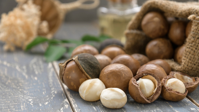 Macadamia nuts spilling from sack