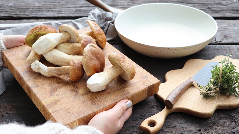 Fresh mushrooms on cutting board