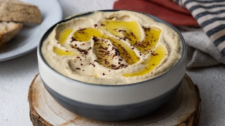 Hummus festooned with olive oil