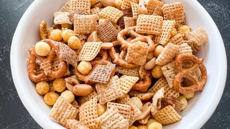 Homemade Chex mix in white bowl