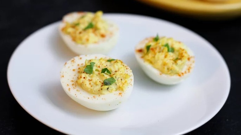 Deviled eggs on a white plate