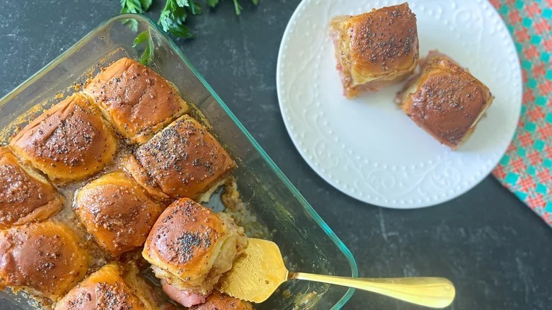 Ham and cheese sliders being served