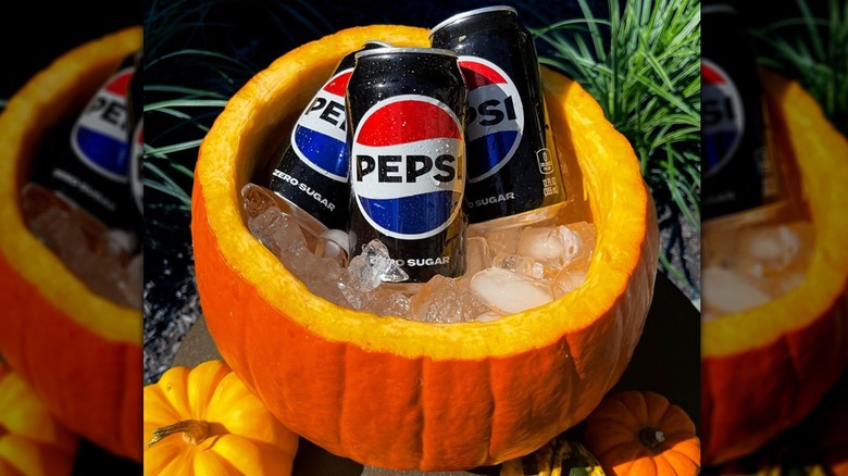 Pepsi cans in pumpkin