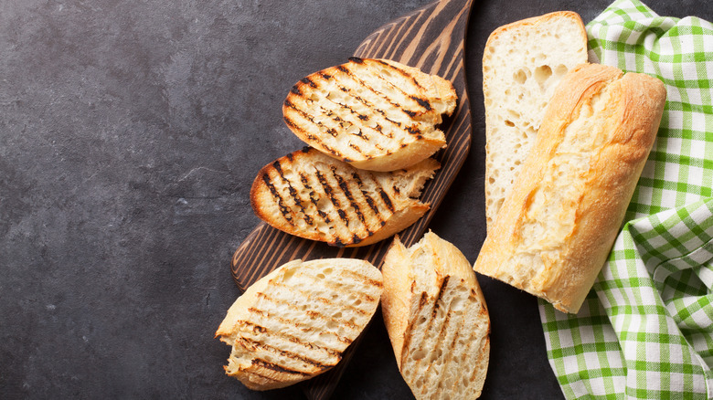 Grilled bread pieces with towel