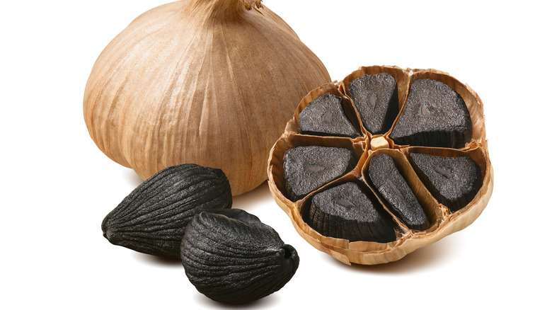 Black garlic cloves and bulbs