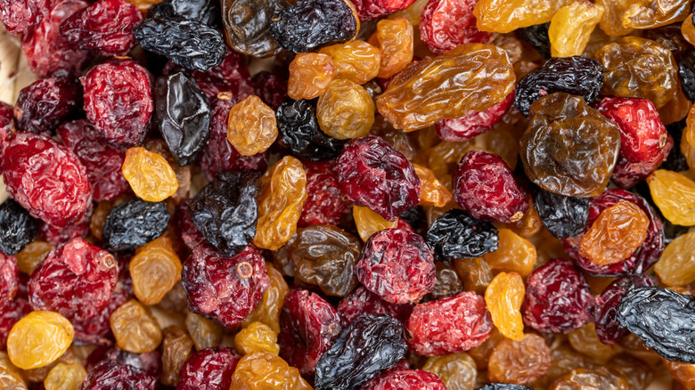 Dried golden and black raisins and cranberries