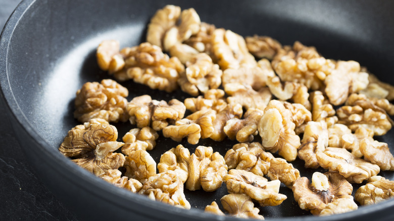 Toasting walnuts in pan