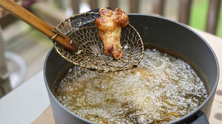 Chicken wing in fryer