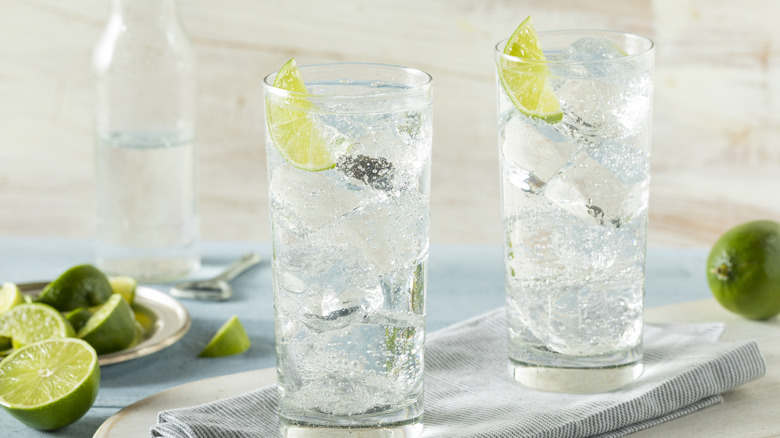 two tall glasses lime wedge