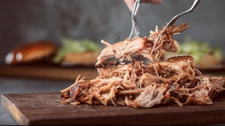 pulled pork on cutting board