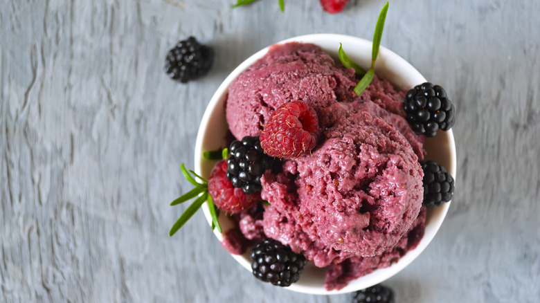 ice cream topped with berries