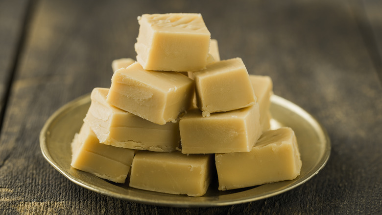 Plate piled high with squares of white chocolate fudge