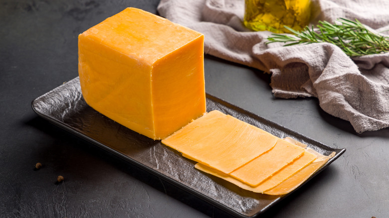 Block and slices of cheddar