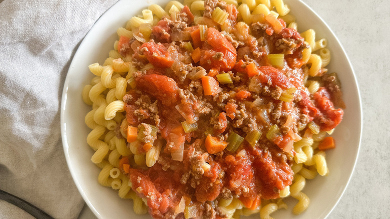 Bolognese with macaroni on plate