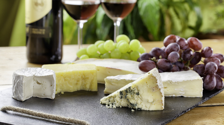 soft cheese, grapes, and wine
