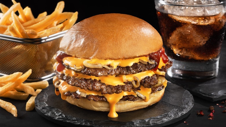 close up of triple cheeseburger