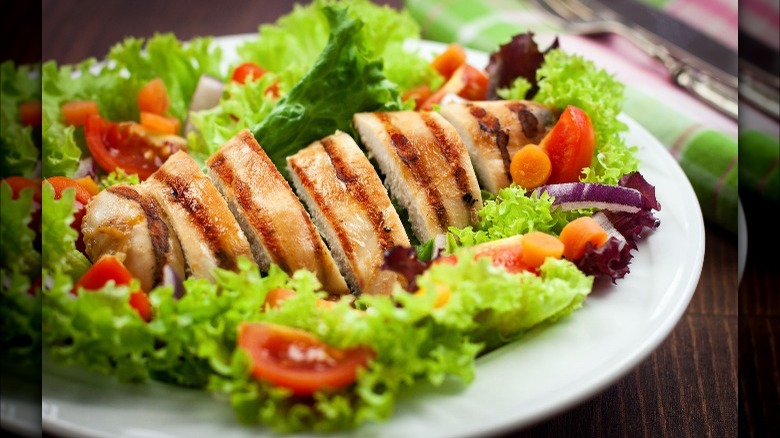 grilled chicken salad on plate