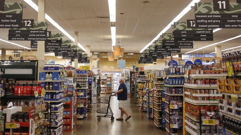 man shopping inside Kroger