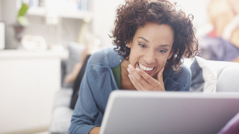 woman looking at computer