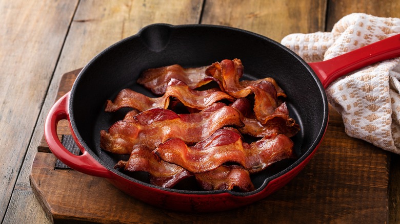 Cooked bacon in frying pan