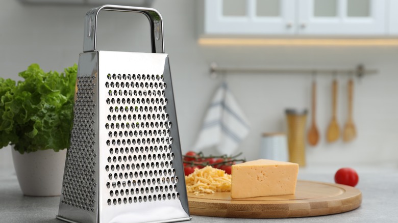 grater next to cheese platter