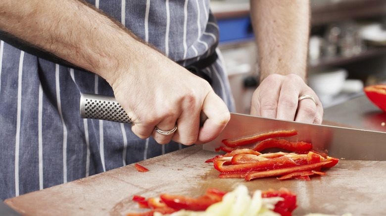 cutting peppers with knife