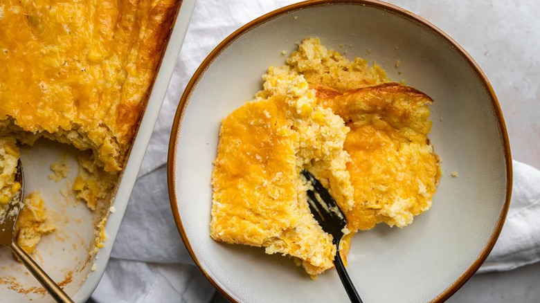 Fork scooping corn casserole