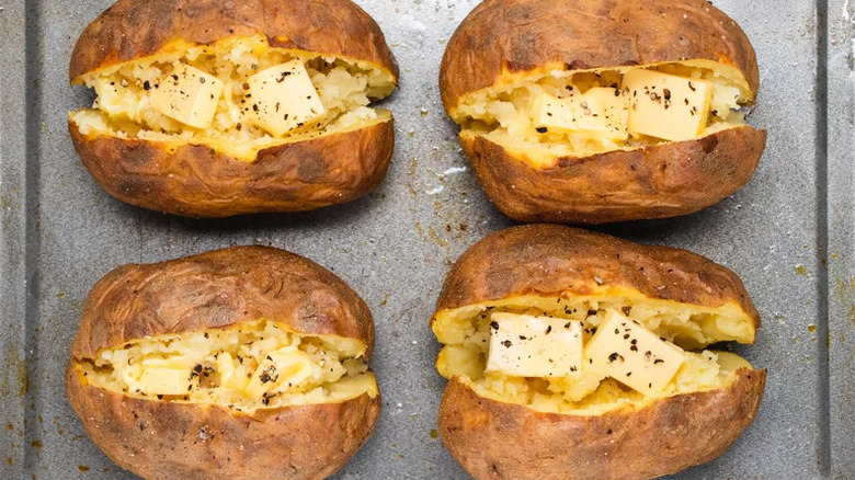 Crispy whole baked potatoes