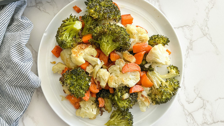 Plate of assorted cooked vegetables