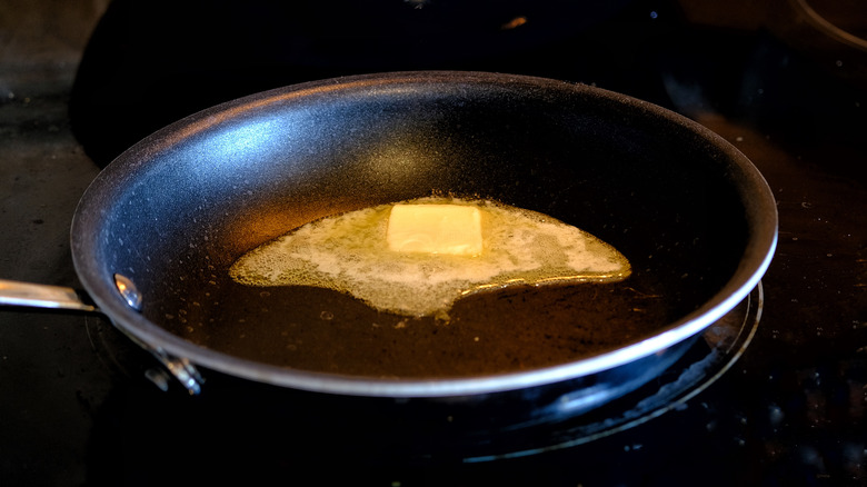 Butter sizzling in a pan