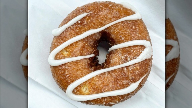 Donut with white icing drizzle