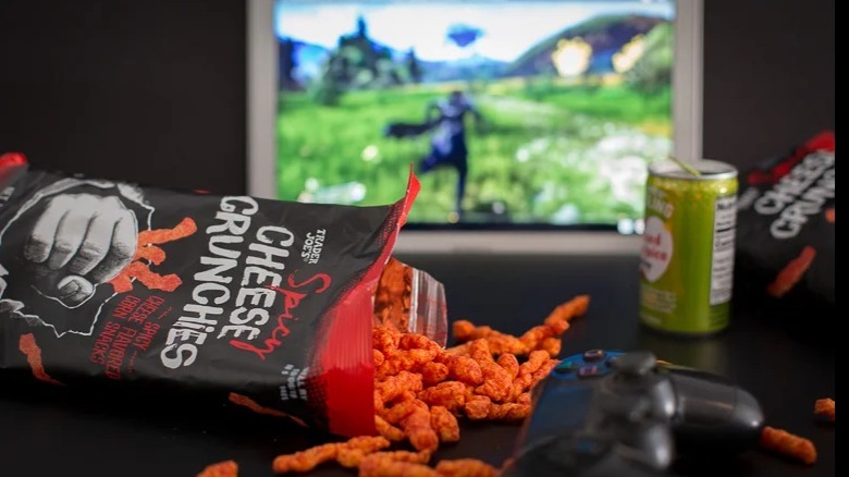 Spicy cheese crunchies and video games