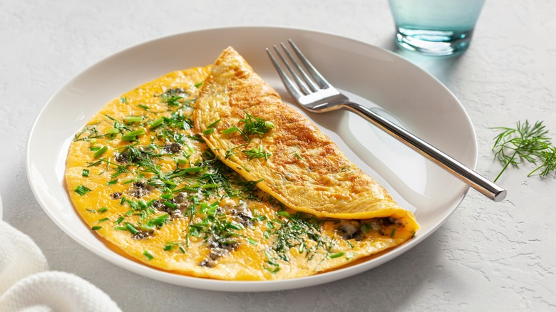 Omelet with herbs on plate