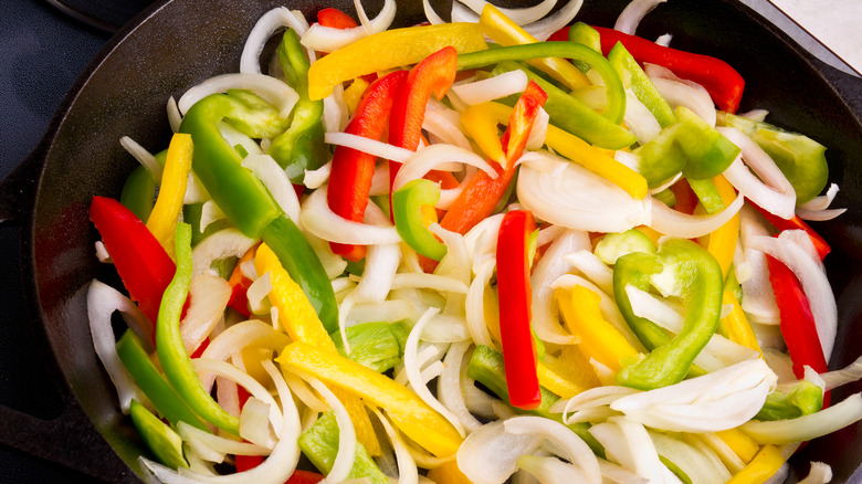 Peppers and onion in pan