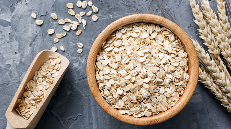 Bowl and scoop with oats