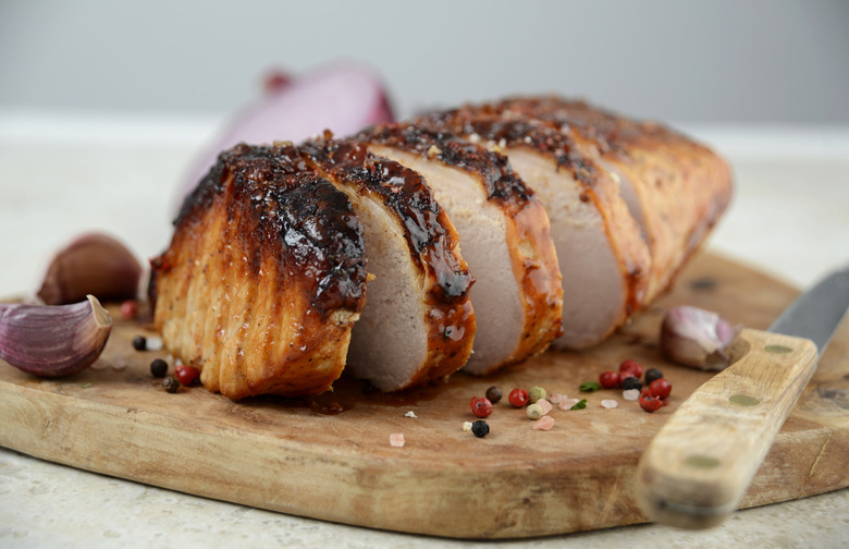 Seared Pork Loin With Vegetable Medley and Fried Egg