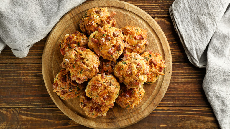 Sausage balls on wooden board