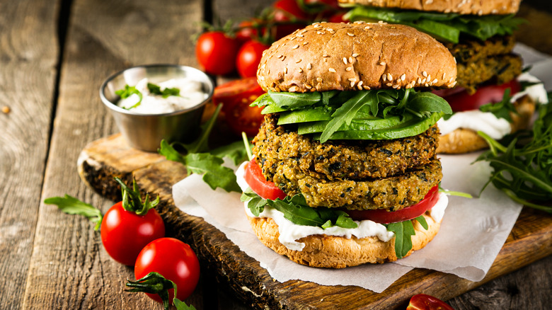 Zucchini burger with tomato and lettuce