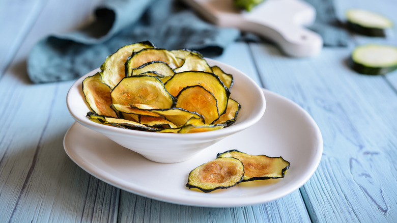 Zucchini chips in white bowl