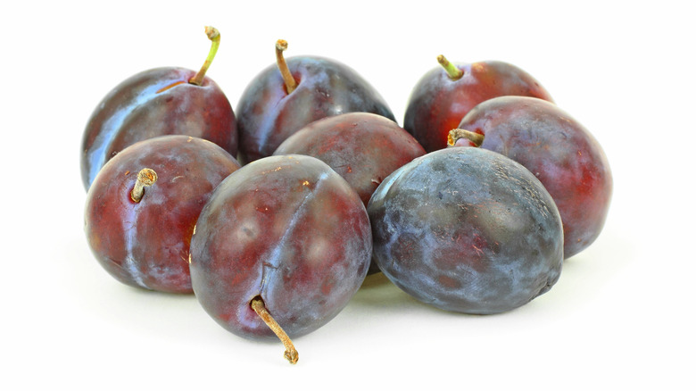 Fresh dark Italian plums