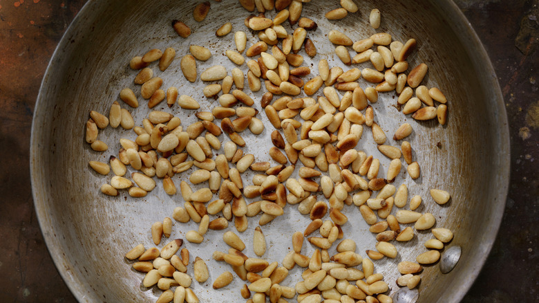 Toasting pine nuts in pan