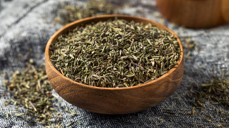 Dried thyme herb in bowl