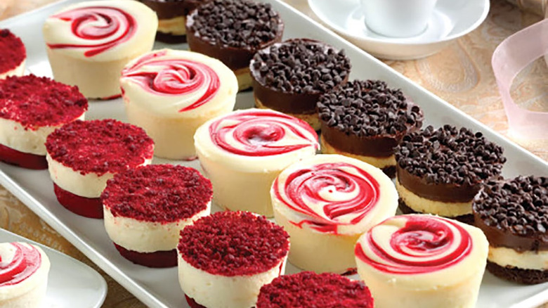 red velvet, raspberry swirl, and devil's food cheesecakes