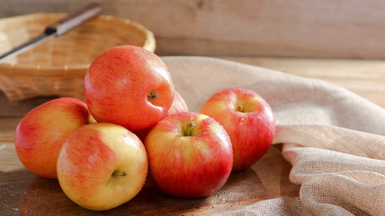 jazz apples on wooden board