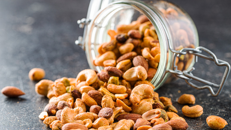 spilled jar of various nuts