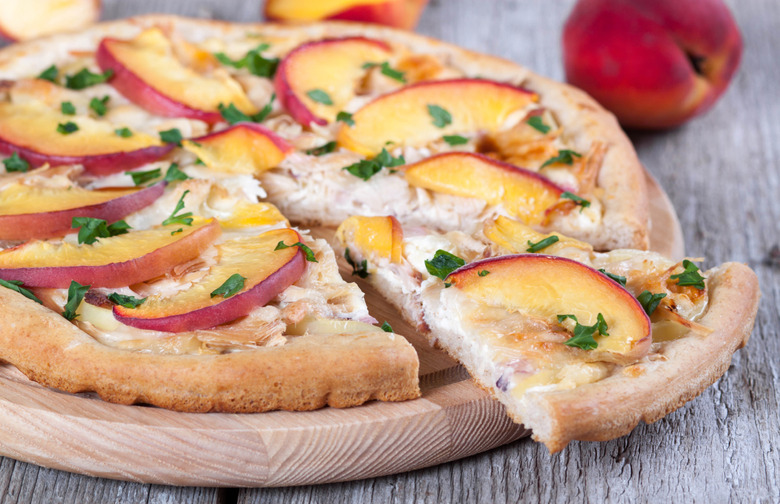 Pizza With Goat Cheese, Peaches, and Almond-Tarragon Pesto Recipe