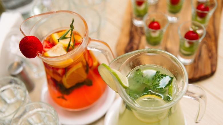 Two types of cocktails in pitchers