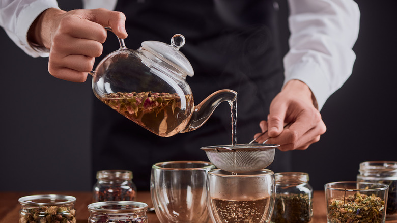 brewing tea being poured