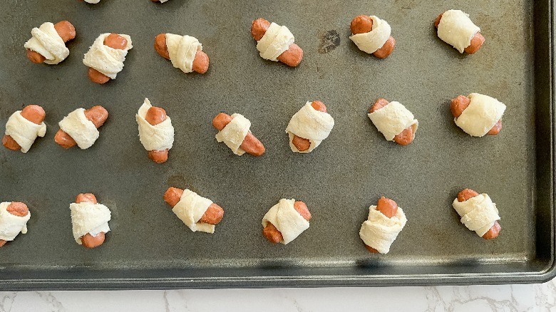 pigs in a blanket on baking sheet