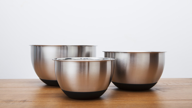 set of three metal bowls